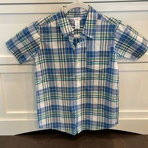 Never worn Carter’s plaid shirt. Boys size 12.